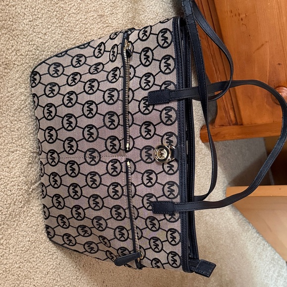 Michael Kors Handbags - Michael Kors Monogram Black and Tan Tote